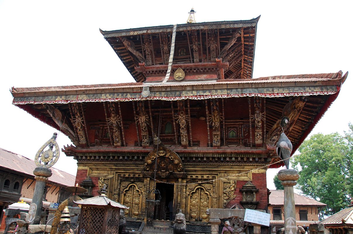 Kathmandu Changu Narayan 16 Changu Narayan Temple Main Entrance The main entrance to the Changu Narayan Temple is on the west side with two of the traditional symbols of Vishnu on the pillars to the left and right � the chakra wheel and conch shell.